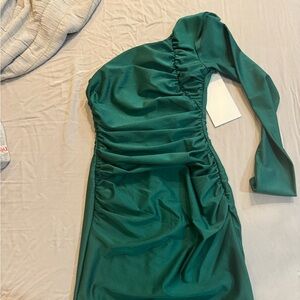 Honey and Rosie one shoulder hunter green mini dress.